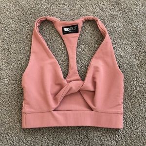 Pink beach riot twisty sports bra
